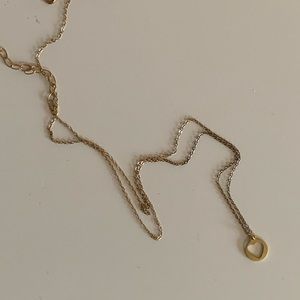 Gold heart cut out necklace